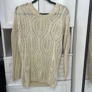 Cream colored women’s sweater M
